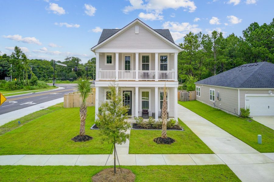 Front exterior of a new home in Limehouse Village: Row Collection, Summerville, SC, highlighting curb appeal (Image 19).
