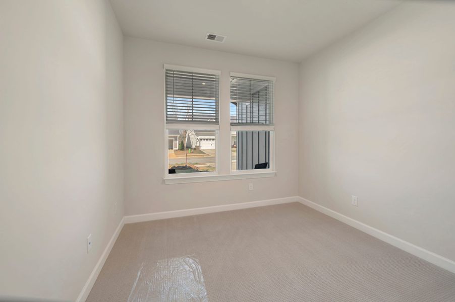 Representative unfurnished interior of a home built from the Aspen Creek by Tri Pointe Homes in Altis At Serenity | A 55+ Community, Fuquay Varina (Image 22).