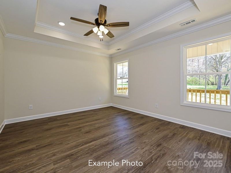 Example Photo Example Photo