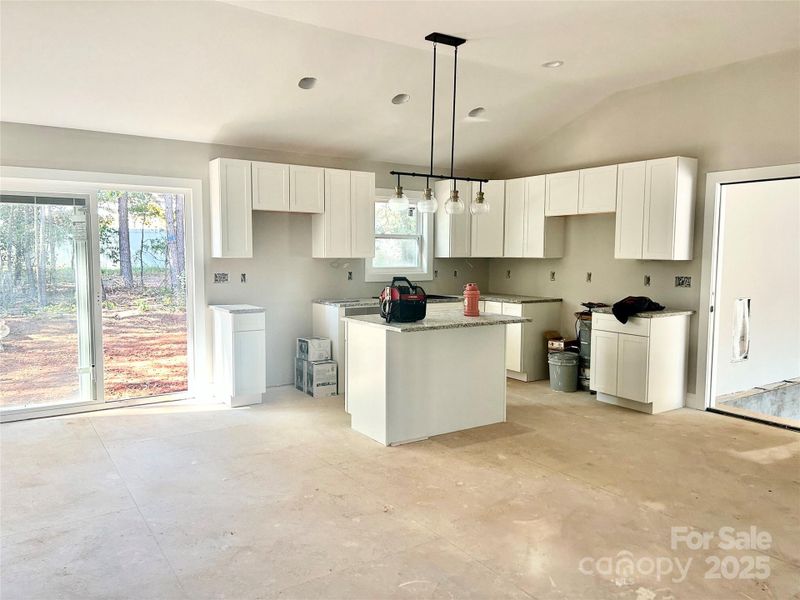 Kitchen- granite counter tops, stainless steel appliances coming