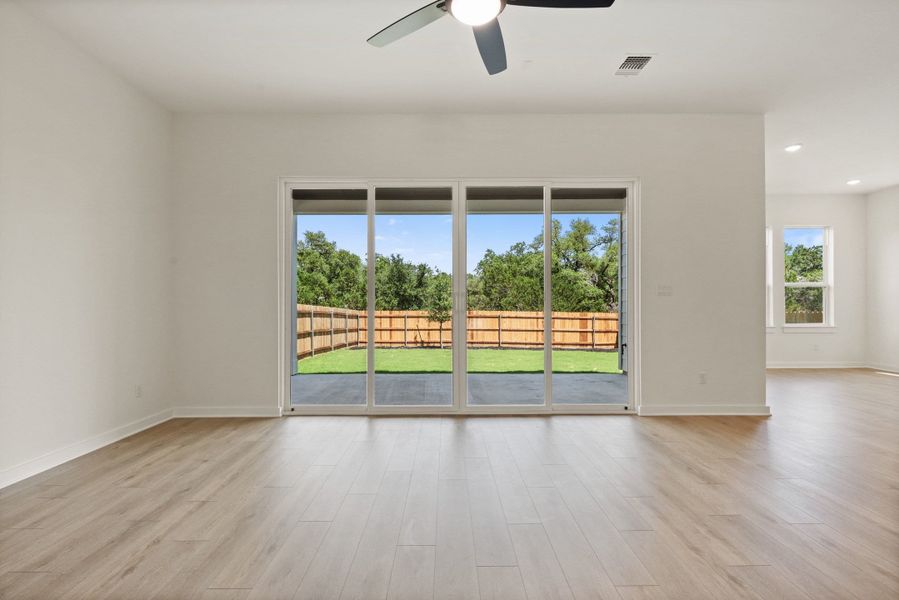 Spacious, unfurnished interior of a new home in Heritage, Dripping Springs (Image 27).