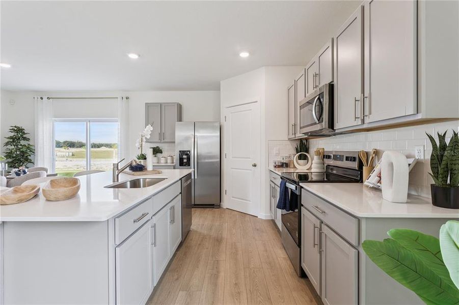Furnished interior view inside a new home in Crossroads at Kelly Park, Apopka (Image 3).