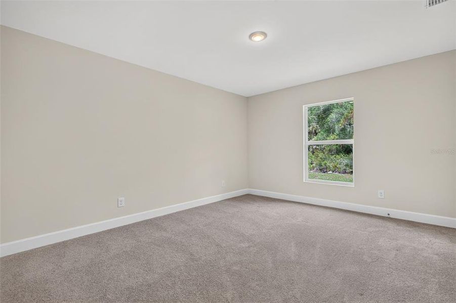 Spacious, unfurnished interior of a new home in , Port Charlotte (Image 26).