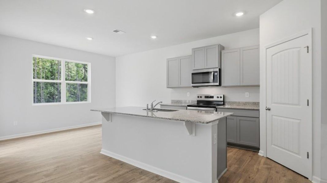 Furnished interior view inside a new home in Oaks at Cedar Grove, Fairburn (Image 8).