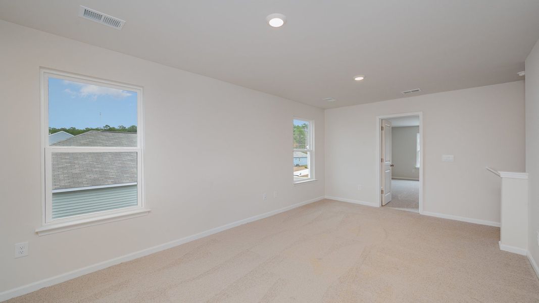 Spacious, unfurnished interior of a new home in Indigo Preserve, Leland (Image 19).