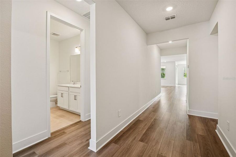 Spacious, unfurnished interior of a new home in Legends Preserve - Signature Series, Daytona Beach (Image 20).