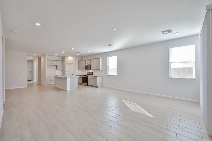 A large empty room with white walls. A large empty room with white walls.