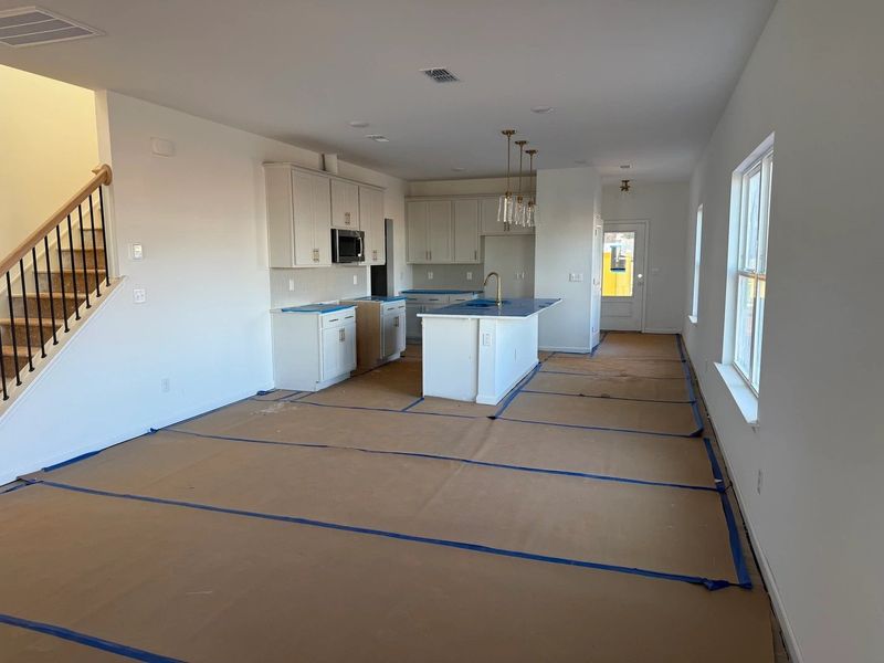 Family Room featuring the AW Collection® Serene - Open space with natural finishes and light.