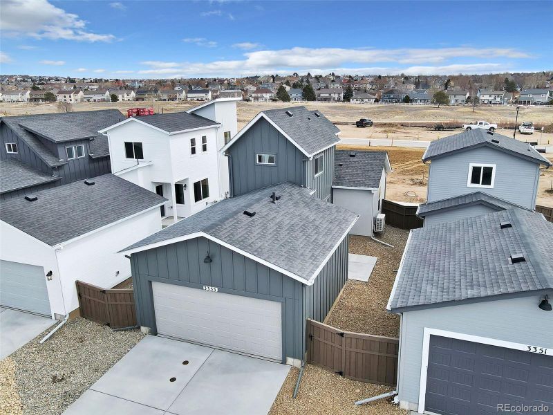 Front exterior of a new home in , Colorado Springs, CO, highlighting curb appeal (Image 25). Front exterior of a new home in , Colorado Springs, CO, highlighting curb appeal (Image 25).