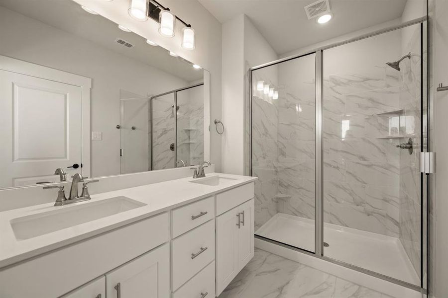 Plenty of room for two in this lovely owner's bath! Plenty of room for two in this lovely owner's bath!