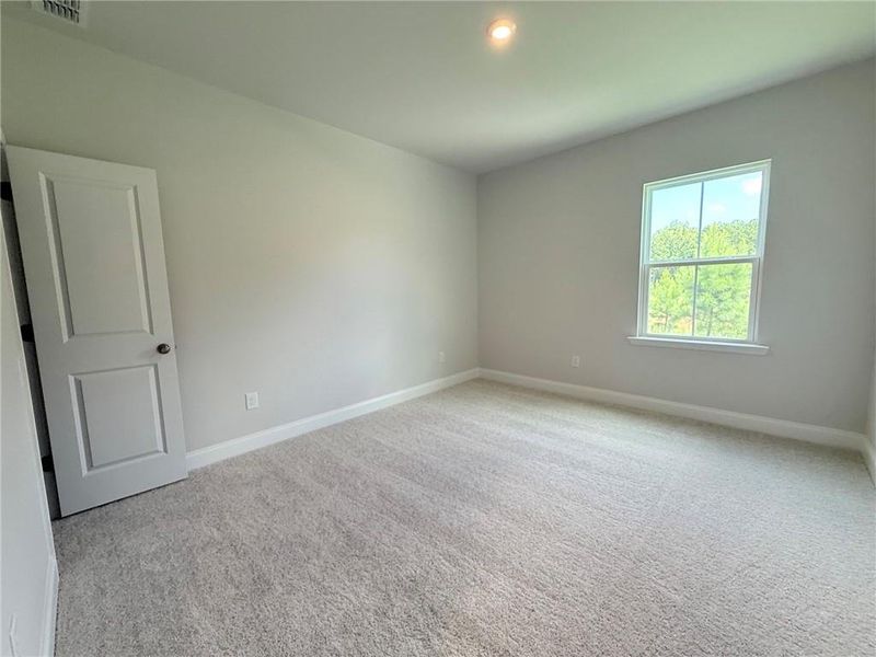 Spacious, unfurnished interior of a new home in Berkeley Mill, Cumming (Image 9).