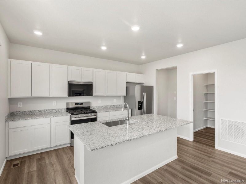 Furnished interior view inside a new home in , Commerce City (Image 8). Furnished interior view inside a new home in , Commerce City (Image 8).