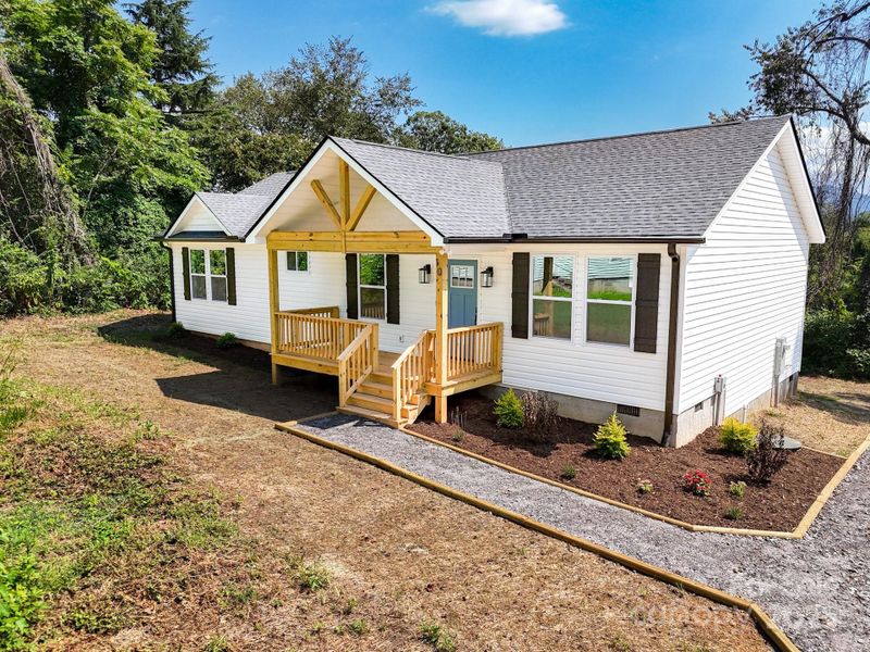 Front exterior of a new home in , Asheville, NC, highlighting curb appeal (Image 21).