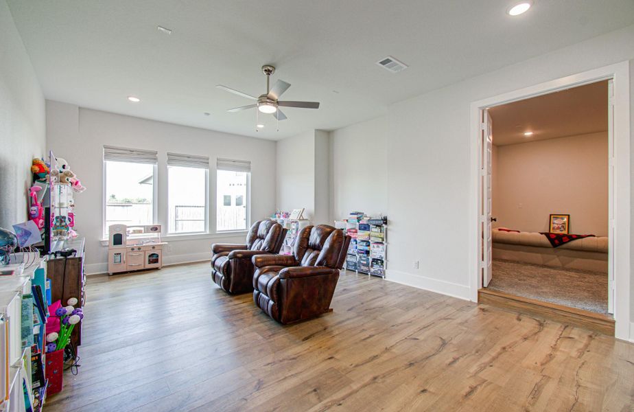 Furnished interior view inside a new home in , Manvel (Image 28).