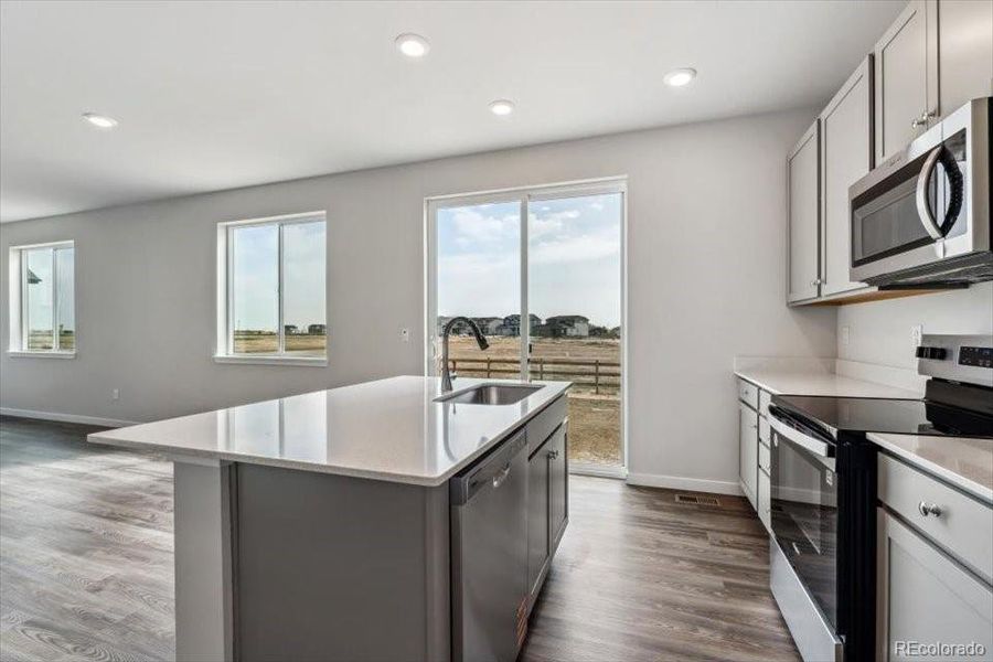 Furnished interior view inside a new home in Red Barn Meadows, Mead (Image 11).