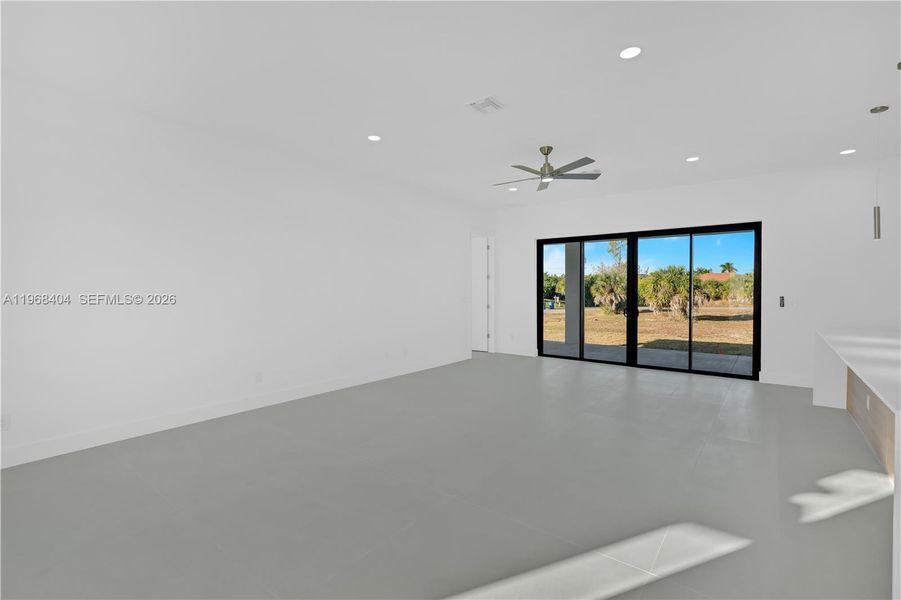 Spacious, unfurnished interior of a new home in , Port Charlotte (Image 42).