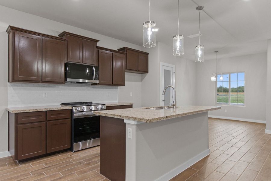 Representative furnished interior of a home built from the Clovis by Hakes Brothers in Monte Cielo, Weslaco (Image 5).