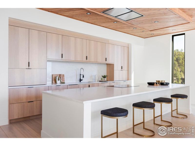 Inside the 4,357-square-foot residence, a soothing palette of warm materials is accompanied by thoughtful illumination and premium finishes. Inside the 4,357-square-foot residence, a soothing palette of warm materials is accompanied by thoughtful illumination and premium finishes.