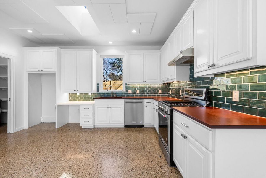 Lots of cabinet space in the back house kitchen.