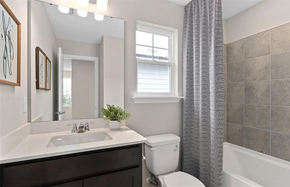 Furnished interior view inside a new home in Silverleaf Oaks, Winter Garden (Image 19).
