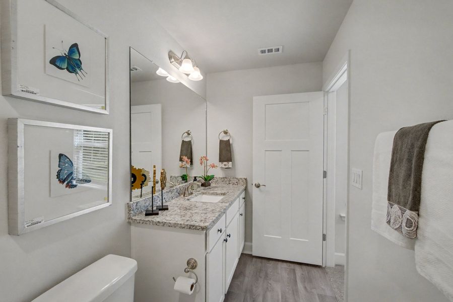 Representative furnished interior of a home built from the Plan 1250 by Adams Homes in Turtle Creek, Cantonment (Image 8).