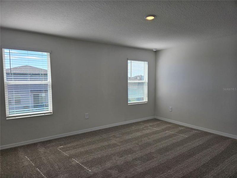 Spacious, unfurnished interior of a new home in Lawson Dunes - Signature Series, Haines City (Image 43).