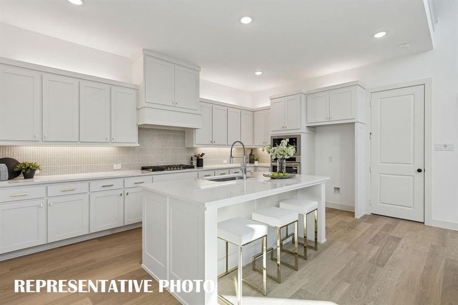 You'll enjoy ample storage and prep space in this dream kitchen!  REPRESENTATIVE PHOTO