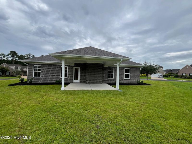Front exterior of a new home in Palmetto Creek, Bolivia, NC, highlighting curb appeal (Image 20).