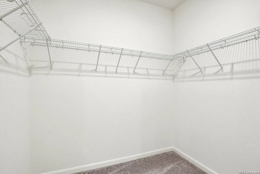 Spacious, unfurnished interior of a new home in Sutton Farms, San Antonio (Image 6).