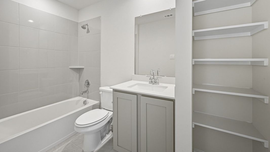 Representative furnished interior of a home built from the Finn by D.R. Horton in Windchime, Celina (Image 8).