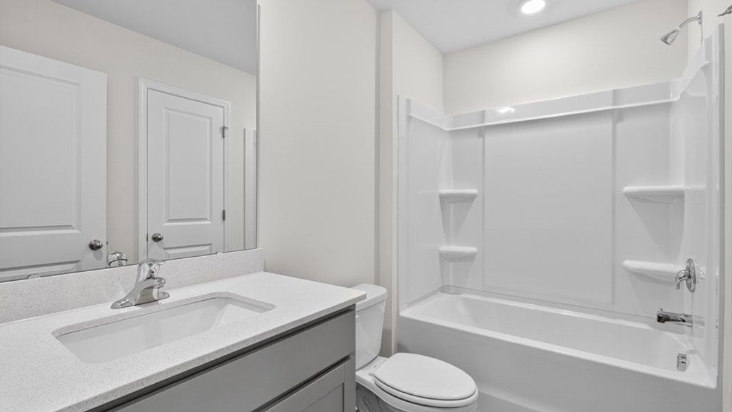 Furnished interior view inside a new home in The Townes at Honeycutt Oaks, Angier (Image 9).
