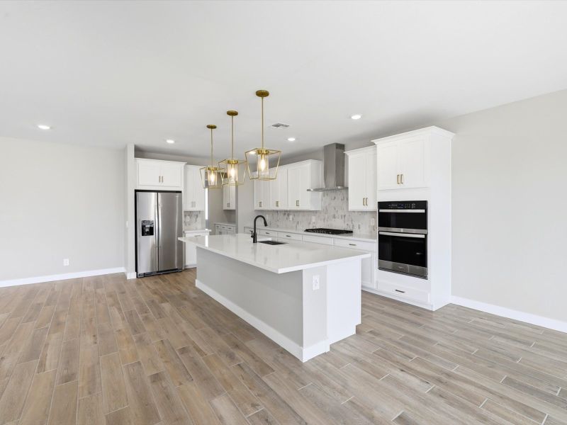 Furnished interior view inside a new home in White Tank Foothills Signature Series, Waddell (Image 3).