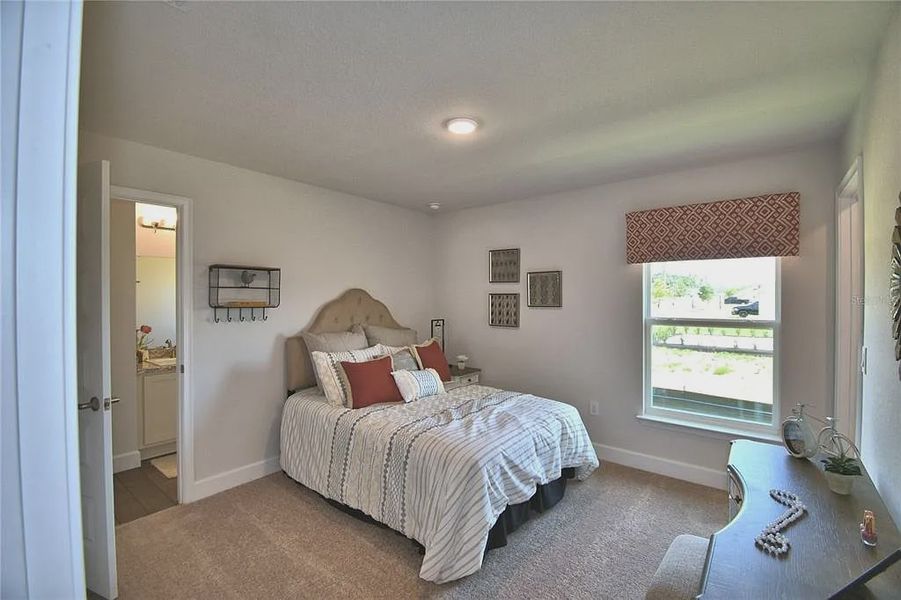 Furnished interior view inside a new home in Magnolia Park, Haines City (Image 25).