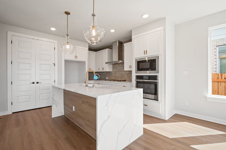 Furnished interior view inside a new home in Terrace Collection at Heritage, Dripping Springs (Image 11).