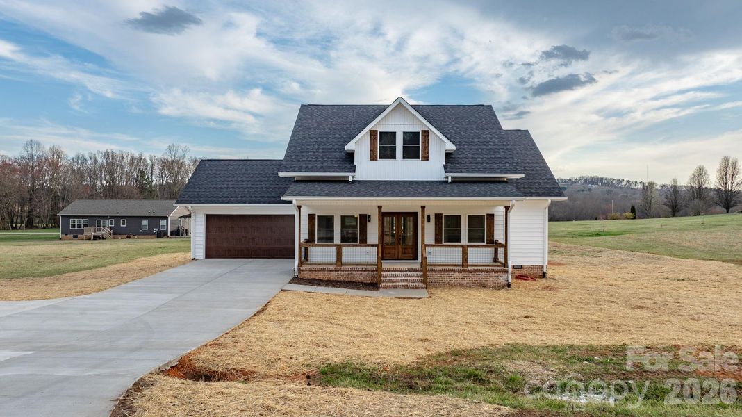 Front exterior of a new home in , Taylorsville, NC, highlighting curb appeal (Image 2). Front exterior of a new home in , Taylorsville, NC, highlighting curb appeal (Image 2).