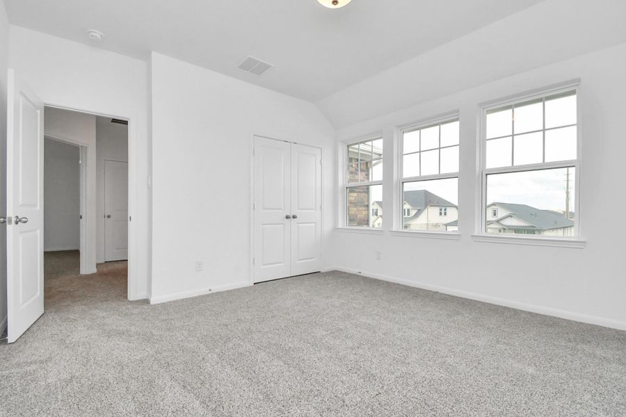 Spacious, unfurnished interior of a new home in Sunterra, Katy (Image 23).