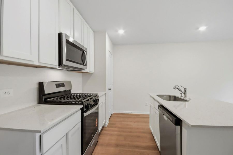 Furnished interior view inside a new home in New Waverly Station, New Waverly (Image 6). Furnished interior view inside a new home in New Waverly Station, New Waverly (Image 6).
