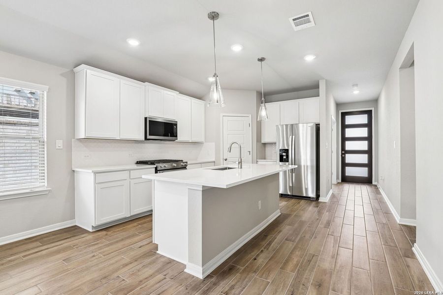Furnished interior view inside a new home in Kallison Ranch, San Antonio (Image 16).
