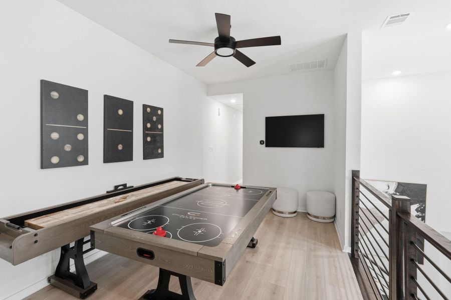 Furnished interior view inside a new home in Bridgeland Central, Cypress (Image 18).