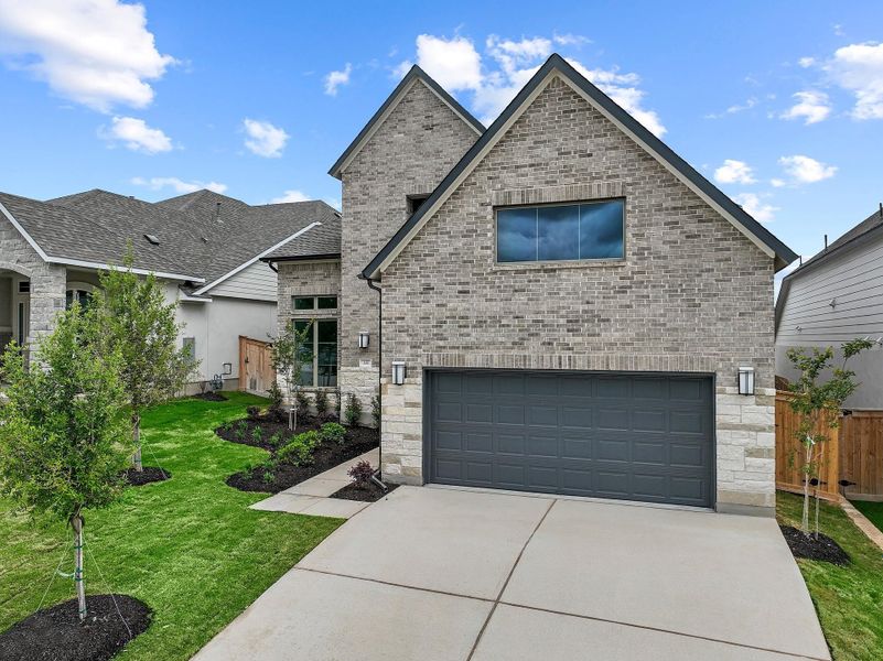 Front exterior of a new home in Nolina, Georgetown, TX, highlighting curb appeal (Image 23).
