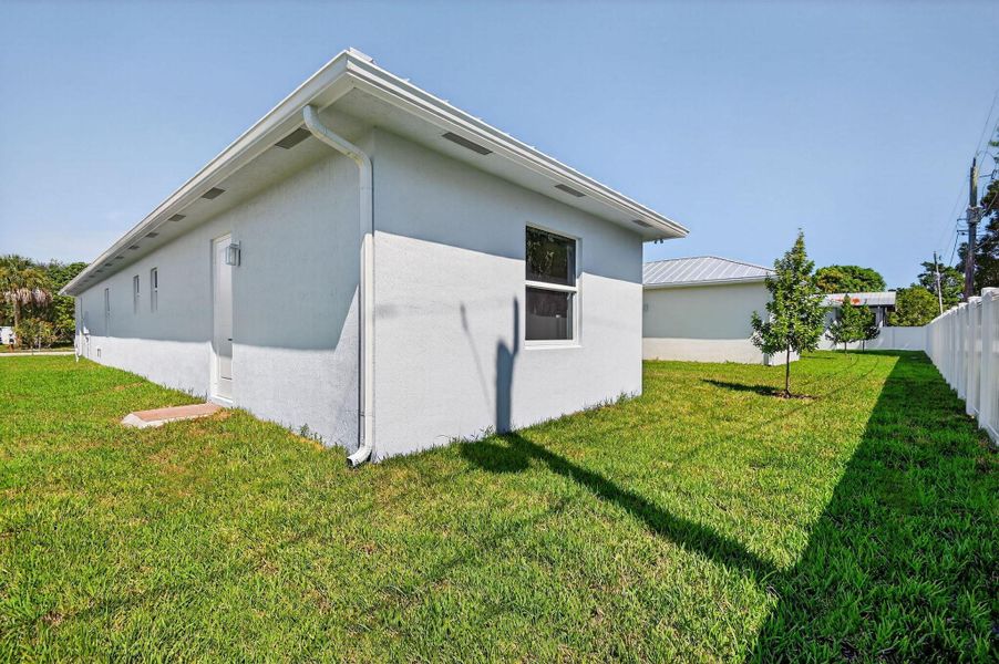 Exterior details and patio area of a home in , Jupiter (Image 25).