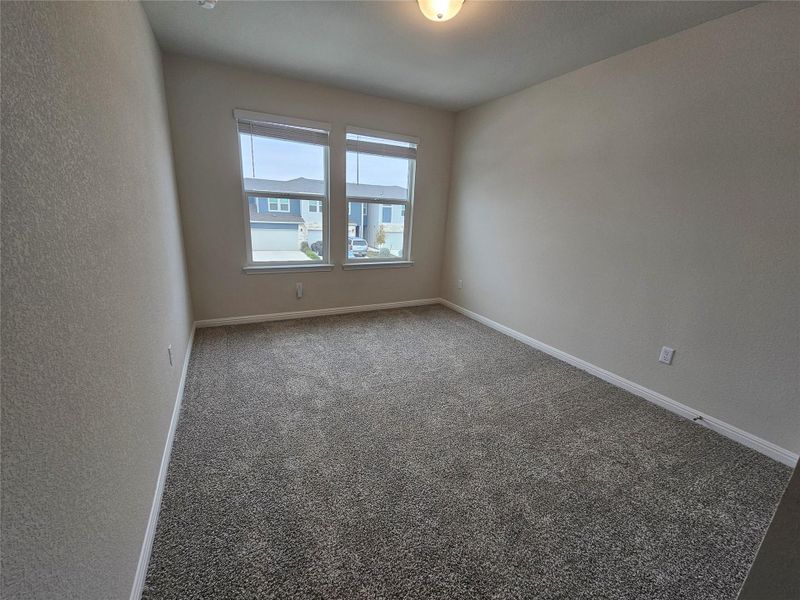 Spacious, unfurnished interior of a new home in Waterstone Village, Kyle (Image 13).