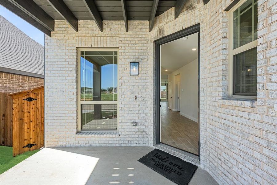 Front exterior of a new home in Mockingbird Hills 60-65, Joshua, TX, highlighting curb appeal (Image 24).