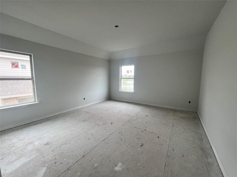 Unfurnished room with baseboards