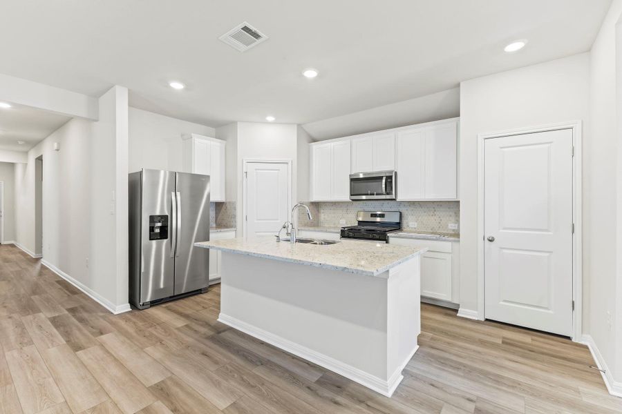 Furnished interior view inside a new home in Flora, Hutto (Image 3). Furnished interior view inside a new home in Flora, Hutto (Image 3).