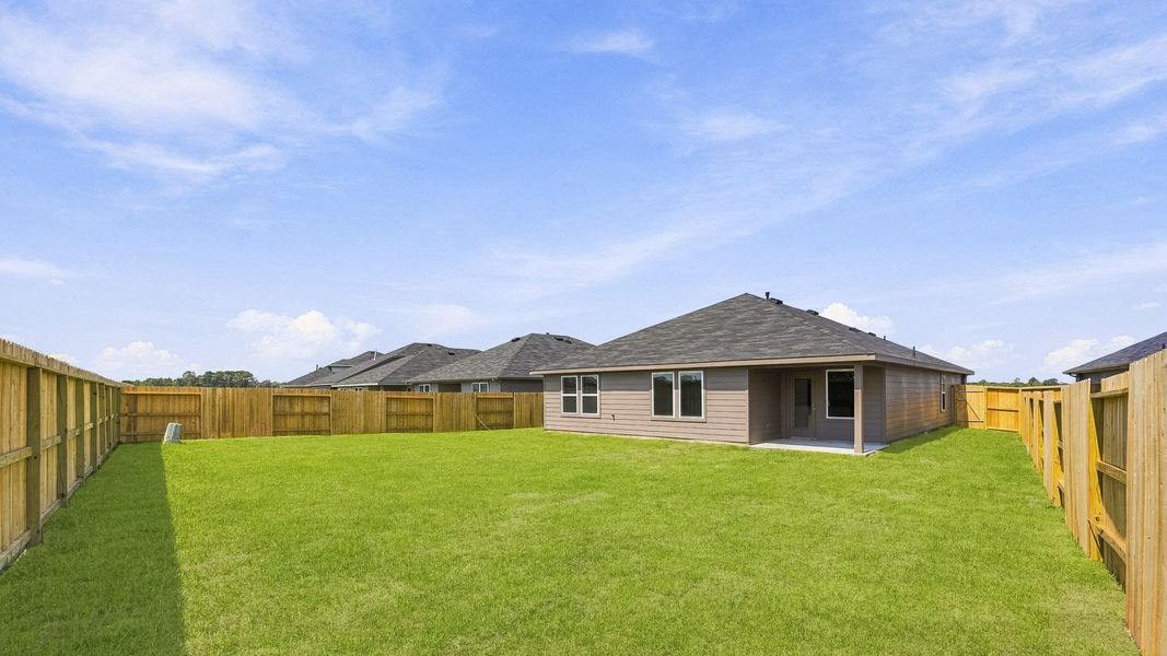 Exterior details and patio area of a home in Newport Pointe, Crosby (Image 3).