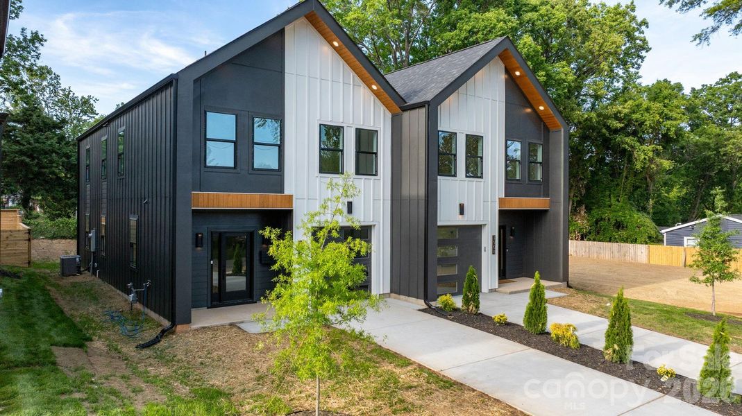 Front exterior of a new home in , Charlotte, NC, highlighting curb appeal (Image 27).