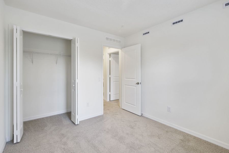 Spacious, unfurnished interior of a new home in Towns at Riverwalk, Sanford (Image 30). Spacious, unfurnished interior of a new home in Towns at Riverwalk, Sanford (Image 30).