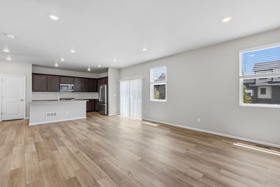 Spacious, unfurnished interior of a new home in Woodrose at Painted Prairie, Aurora (Image 9).
