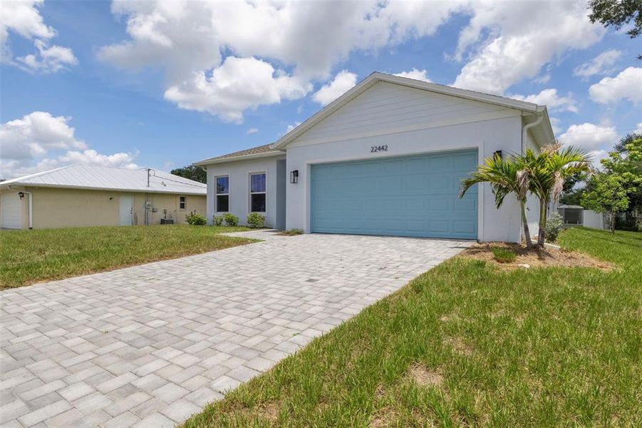 Front exterior of a new home in , Port Charlotte, FL, highlighting curb appeal (Image 23). Front exterior of a new home in , Port Charlotte, FL, highlighting curb appeal (Image 23).